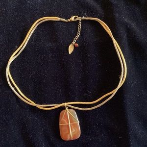 Stone pendant necklace.
